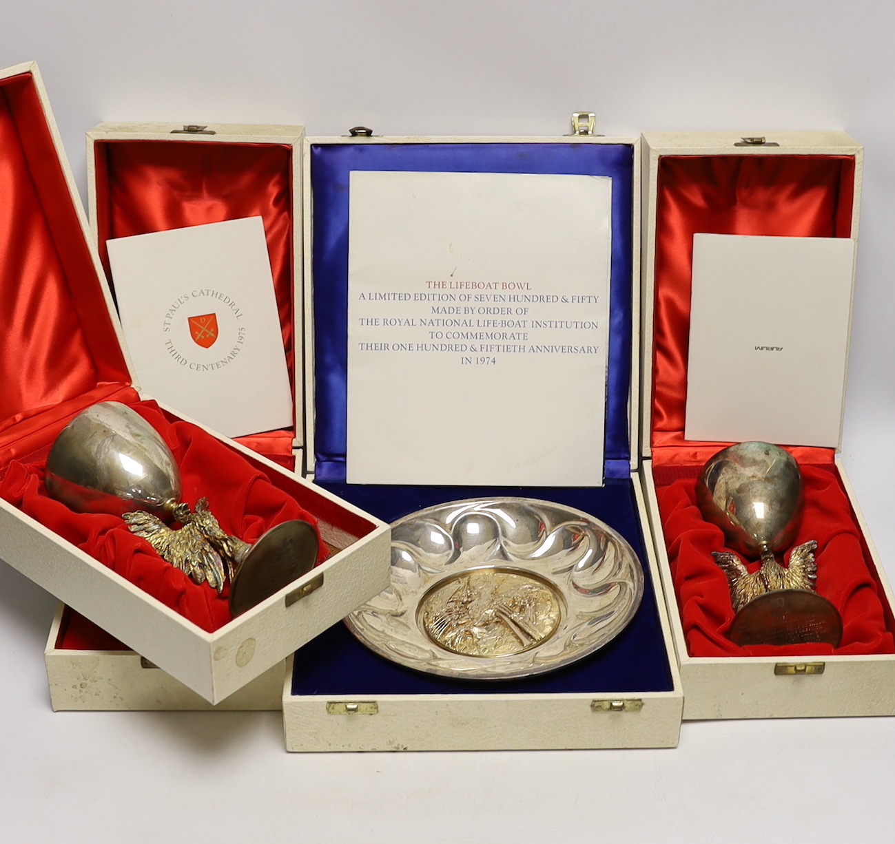 Four cased presentation silver items to include a bowl, numbered 336 of 750, made by Order of the Royal National Lifeboat Institution to commemorate their 105th anniversary in 1974, together with three goblets limited to